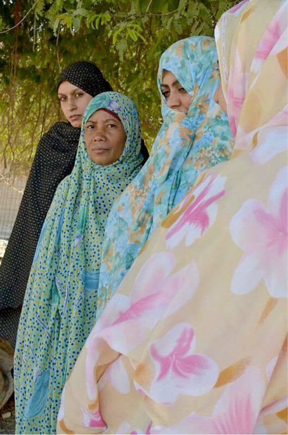نساء مازلن يحتفظن بلبس المشمر في قرى البحرين
