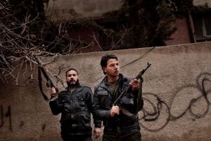 اللاجئون السوريون يطالبون المجتمع الدولي بتسليح الجيش الحر