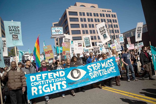 نشطاء يتظاهرون ضد وكالة الأمن القومي الأميركية - AFP