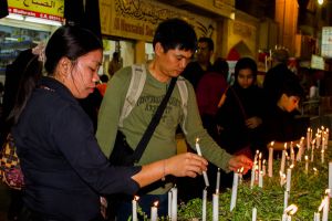 المرسم الحسيني يتضامن مع الشعب الفلبيني بفعالية الشموع ..(شاهد الصور)