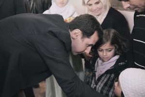 الرئيس السوري يتفقد مركزا للمهجرين في ريف دمشق