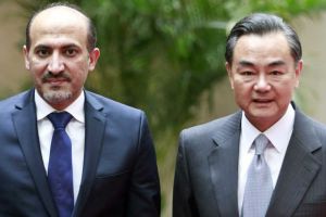 زعيم المعارضة السورية يلتقي وزير الخارجية الصيني في بكين