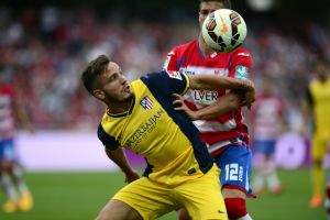 أتليتيكو مدريد وبلنسية يضمنان اللعب في دوري الأبطال