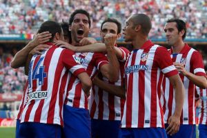 أتليتيكو مدريد وبلنسية يضمنان اللعب في دوري الأبطال