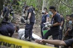 ماليزيا تعثر على مقابر جماعية قرب الحدود مع تايلند