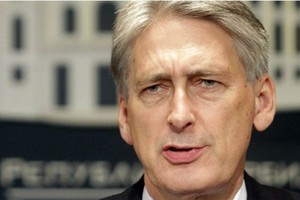 وزير خارجية بريطانيا: يجب على الأسد أن يرحل 'في مرحلة ما'