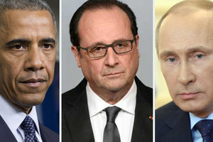 هجمات باريس وتفجير الطائرة الروسية يرسمان ملامح تحالف جديد