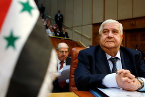 المعلم إلى بكين بعد زيارة العبادي لها