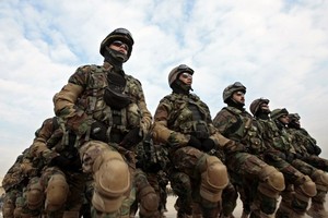  مقتل 8 ضباط عراقيين وإصابة 28 في تفجيرات انتحارية شمال بغداد