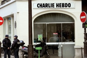 غضب إزاء كاريكاتور فرنسي ساخر يسيء لطفل سوري غريق