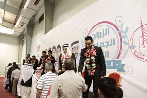 بالصور... حفل الزواج الجماعي الأول بالجفير