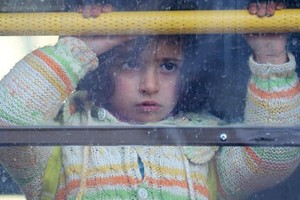 50 ألف سوري يفرون من حلب بسبب القتال