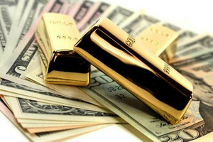 الذهب يهبط 2% مع تعافي الأسهم وجني أرباح في الصين