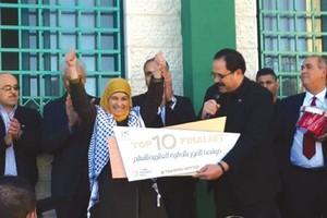 معلمة فلسطينية بين العشرة الأوائل في العالم