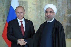 بوتين وروحاني يتفقان على التعاون لحل الأزمة السورية