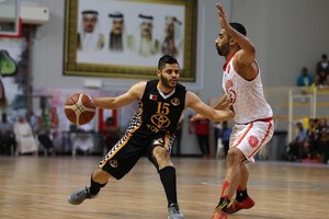 الأهلي يتخطى المحرق ويتصدر مربع السلة