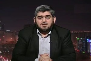 كبير المفاوضين بوفد المعارضة السورية يطالب بإعدام الأسد