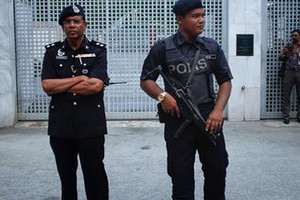 ماليزيا: لا اتهامات ضد صحفيين أستراليين اعتقلا في البلاد