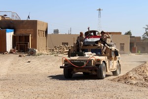 مقتل 4 عراقيين وإصابة 21 بتفجيرات في بغداد