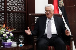 عباس يبحث في برلين عن دعم ضد سياسة الاستيطان الإسرائيلية 