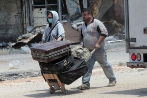 اتفاق يدعو إلى إخراج أناس من بلدات سورية محاصرة