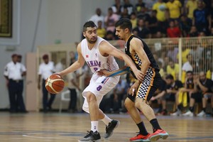 شاهد بالصور... المنامة يعادل كفة نهائيات دوري السلة بالفوز على الأهلي