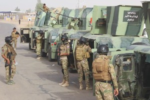 العراق يسعى لاستعادة السيطرة على الطريق الدولية إلى الأردن