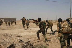 'داعش' يحصن مواقعه غداة هجوم مزدوج ضد معاقله في سورية والعراق