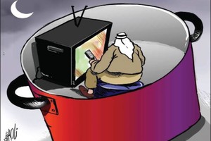 كاركاتير 'الغد': الأكل والتلفاز أبرز ظاهرة في رمضان