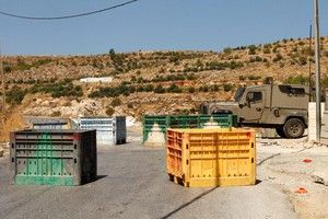 قوات إسرائيلية تعتقل 11 فلسطينياً في أنحاء مختلفة من الضفة الغربية