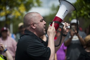 مسئولو ولايتي مينيسوتا ولويزيانا الأميركيتين يقولون إنهم لن يسمحوا باحتجاجات عنيفة