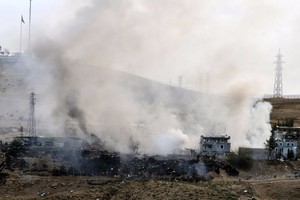 بالصور... مقتل 11 شرطياً تركياً وإصابة 78 شخصاً في هجوم انتحاري قرب سورية تبناه المتمردون الأكراد