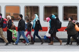 ألمانيا تتوقع استقبال 300 الف طالب لجوء العام 2016