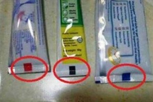 ماذا يعني اللون في أسفل أنبوب معجون الأسنان