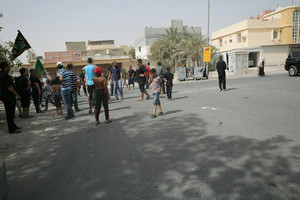 مناوشات أمنية بعد محاولة الشرطة نزع سواد عاشوراء بقرية أبو صيبع