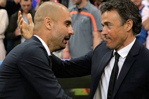 لويس إنريكي يدافع عن غوارديولا