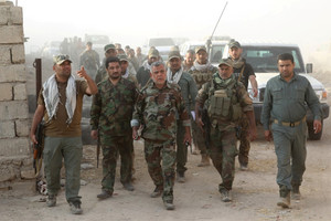 الشرطة العراقية تتصدى للانتحاريين في معركة الموصل