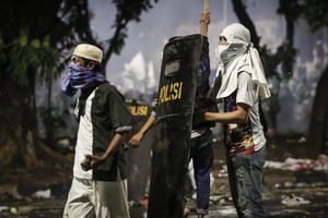 الرئيس الإندونيسي يلغي زيارته لاستراليا بعد احتجاجات في جاكرتا