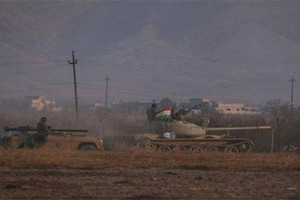 قوات البشمركة تقتحم قرية خاضعة لداعش والجيش يقاتل بالموصل