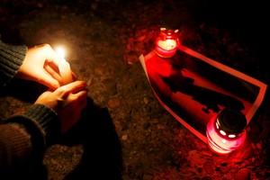 بالصور... يوم حداد على ضحايا تحطم الطائرة العسكرية في روسيا اليوم الإثنين