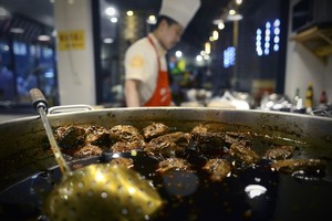 'باچه' رأس الأرنب طبق مميز في سيشوان الصينية