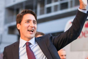 رئيس الوزراء الكندي يرحب بالمهاجرين ردا على الحظر الأميركي