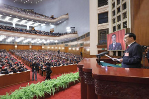 تقرير: الاقتصاد الصيني يتغلب على تحديات دولية ومحلية