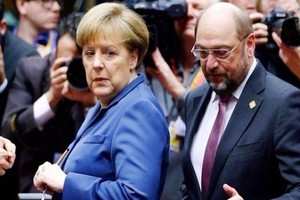 ميركل تتفوق على شولتس في استطلاع رأي ألماني