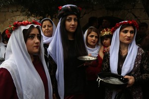 بالصور: أيزيديون يحتفلون بعيد رأس السنة في شمال العراق 