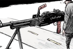 كاريكاتير 'الشرق الأوسط' مستقبل ليبيا وفوضى السلاح