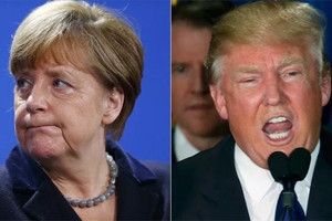 ترامب يعد في اتصال هاتفي مع ميركل بدعم جهود السلام في شرقي أوكرانيا
