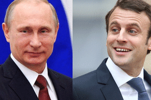أول اتصال هاتفي بين بوتين وماكرون