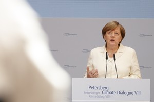 ميركل تحذر من الكلل في مكافحة تغير المناخ