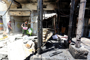 42 قتيلا في ثلاثة تفجيرات في العراق واستمرار المعارك في الموصل